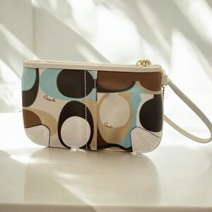 Coach multi color brown teal & cream C monogram wristlet
